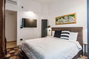 Ένα ή περισσότερα κρεβάτια σε δωμάτιο στο La Dimora sotto le Stelle