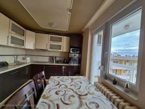 Η κουζίνα ή μικρή κουζίνα στο Apartman Veki