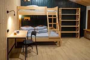 Ένα ή περισσότερα κρεβάτια σε δωμάτιο στο Bilyi Slon Gadzhyna