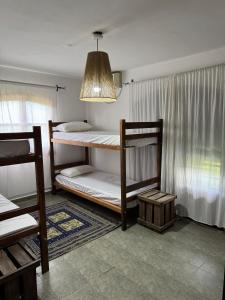 Postel nebo postele na pokoji v ubytování Hostal Bel Vivere + 23 fotografií