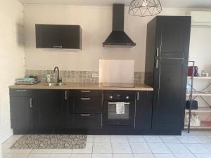 Kuchyň nebo kuchyňský kout v ubytování Ti cosy + 2 fotografie