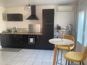 Kuchyň nebo kuchyňský kout v ubytování Ti cosy