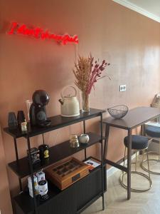 Posezení v ubytování Appartement lumineux avec parking, centre Clermont-Ferrand + 16 fotografií