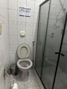 Koupelna v ubytování AP Piúma Praia + 6 fotografií