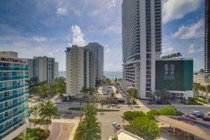 a city with tall buildings and a parking lot at Upscale Condo w/ Pool Access in Hyde Beach House! in Hollywood