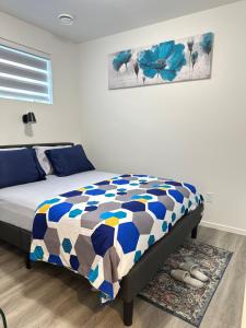 Voodi või voodid majutusasutuse Modern Basement Suite near West Edmonton Mall toas