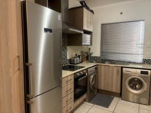 Kuchyň nebo kuchyňský kout v ubytování The Cube Rivonia Sandton Luxury Suites + 22 fotografií