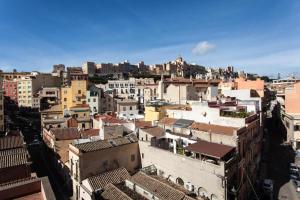 an aerial view of a city with buildings at Eva Luxury Saint Remy in Cagliari