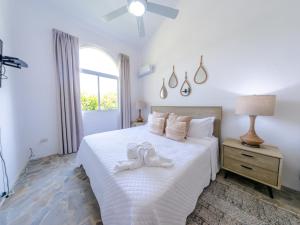 Ένα ή περισσότερα κρεβάτια σε δωμάτιο στο Esencia Espanola Sosua