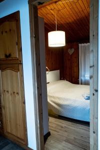 Ένα ή περισσότερα κρεβάτια σε δωμάτιο στο Casa vacane Al Lido