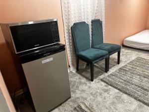 TV a/nebo společenská místnost v ubytování The Coatesville Haven