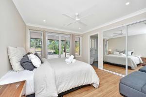 Ένα ή περισσότερα κρεβάτια σε δωμάτιο στο Rose at the Vineyard