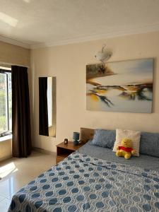 Giường trong phòng chung tại Perfect 2-Bedroom Apartment in St Julian