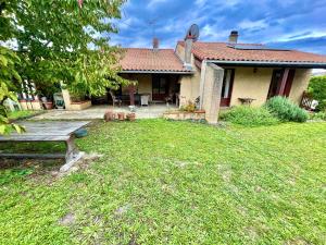 Κήπος έξω από το " Parenthèse Muretaine " Terrasse - 8 Pers - Wifi