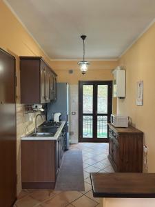 a kitchen with a sink and a counter top at La Piccola Stella in Castel del Giudice