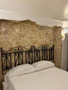 Ένα ή περισσότερα κρεβάτια σε δωμάτιο στο Casa Dea - Bungalow Aphrodite