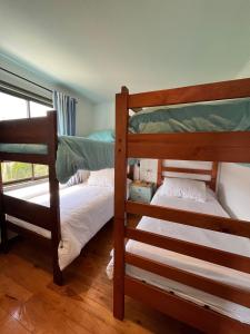 Postel nebo postele na pokoji v ubytování Casa en Laguna de Zapallar a pasos de la playa, recién remodelada