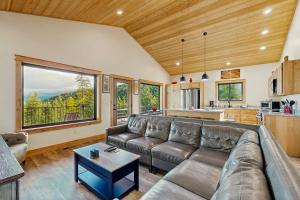 a living room with a couch and a table at Rocky Crest Retreat in Somers