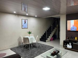 Posezení v ubytování Residência COP 30