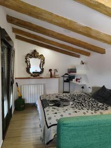 En eller flere senge i et værelse på La casa del patio