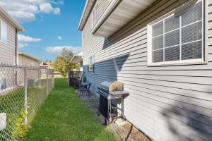 a grill on the side of a house at The Anglers Retreat - Unit A in Belgrade