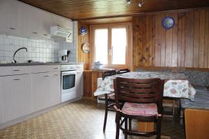 Kuchyň nebo kuchyňský kout v ubytování Chalet Talblick, alte Gasse 40