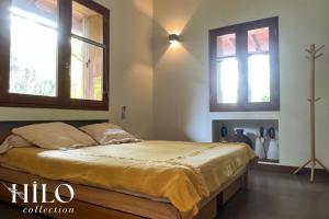 Postel nebo postele na pokoji v ubytování Noddi Beach Villa La Saline by HILO Collection