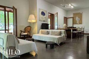 TV a/nebo společenská místnost v ubytování Noddi Beach Villa La Saline by HILO Collection