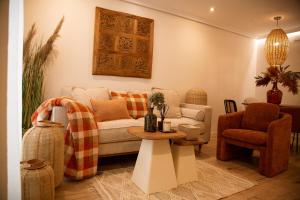 Posezení v ubytování Hidden Gem GRAN TEATRO FALLA SUITES by ApartmentsinCadiz