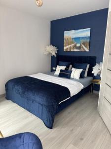 Ένα ή περισσότερα κρεβάτια σε δωμάτιο στο POLA Ustronie Morskie