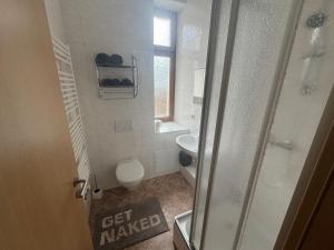 Ένα μπάνιο στο Apartment Wintergarten
