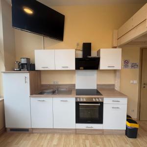 Η κουζίνα ή μικρή κουζίνα στο Apartment Wintergarten +2 φωτογραφίες