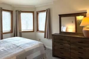 Postel nebo postele na pokoji v ubytování Slopeside 4001