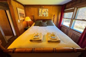 Ένα ή περισσότερα κρεβάτια σε δωμάτιο στο Vermont 1828 Reunion House