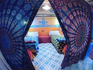 Ένα ή περισσότερα κρεβάτια σε δωμάτιο στο Home khamlia