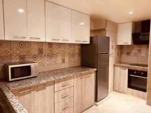 Η κουζίνα ή μικρή κουζίνα στο Penthouse royale avec piscine privé