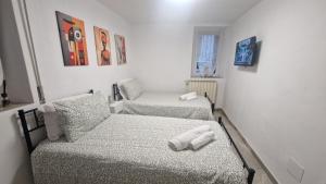 Ένα ή περισσότερα κρεβάτια σε δωμάτιο στο Casa Hanna Garden