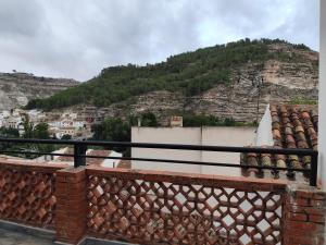 a view from the roof of a building with a mountain at Raíces de Alcalá in Alcalá del Júcar