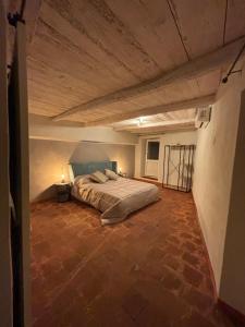 Postel nebo postele na pokoji v ubytování FilAuri La Morra