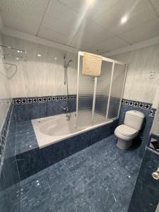 Ένα μπάνιο στο Apartamento Aura céntrico junto a feria