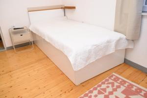 Postel nebo postele na pokoji v ubytování Apartman Natalija