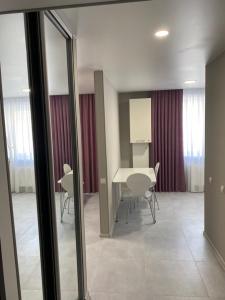 En eller flere senge i et værelse på Kharkivska Street Center