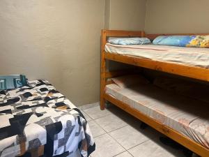 Ένα ή περισσότερα κρεβάτια σε δωμάτιο στο Lamont-Villa