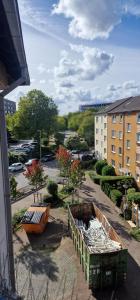 a view of a street with buildings and a boat at Cozy & Fully Equipped Flat in a Prime Location in Essen +3 photos
