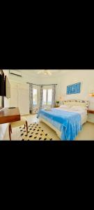 Ένα ή περισσότερα κρεβάτια σε δωμάτιο στο Hotel Plaza la marsa