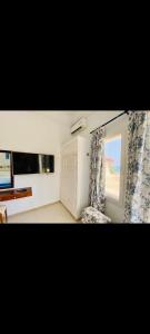 Μια τηλεόραση ή/και κέντρο ψυχαγωγίας στο Hotel Plaza la marsa