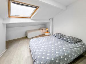 Postel nebo postele na pokoji v ubytování Bel espace familial proche de Paris