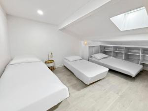 Postel nebo postele na pokoji v ubytování Bel espace familial proche de Paris