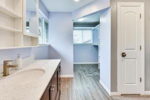a bathroom with a sink and a mirror at Mountain-View Retreat with Hot Tub in Centerville! in Centerville +19 photos