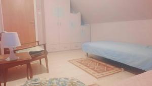 Postel nebo postele na pokoji v ubytování הבית של גלגל